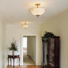 Tuscany™ Family Alabaster Pendants Illuminate A Second Floor Hallway