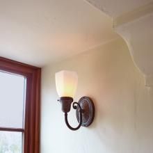 Niche Lit with One Light Sconce