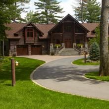 Drive to Log Home with Stonehaven™ Lantern Exterior Lights