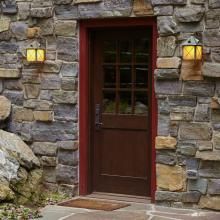 Lower Level Entry Lit with Stonehaven™ Lantern 8" Wide Scrolled Hook Exterior Wall Lights