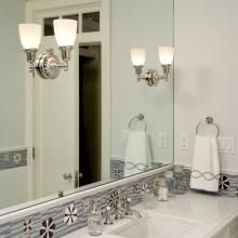 Sunflower™ Sconces Mounted Directly to Mirror Provide Ample Vanity Lighting